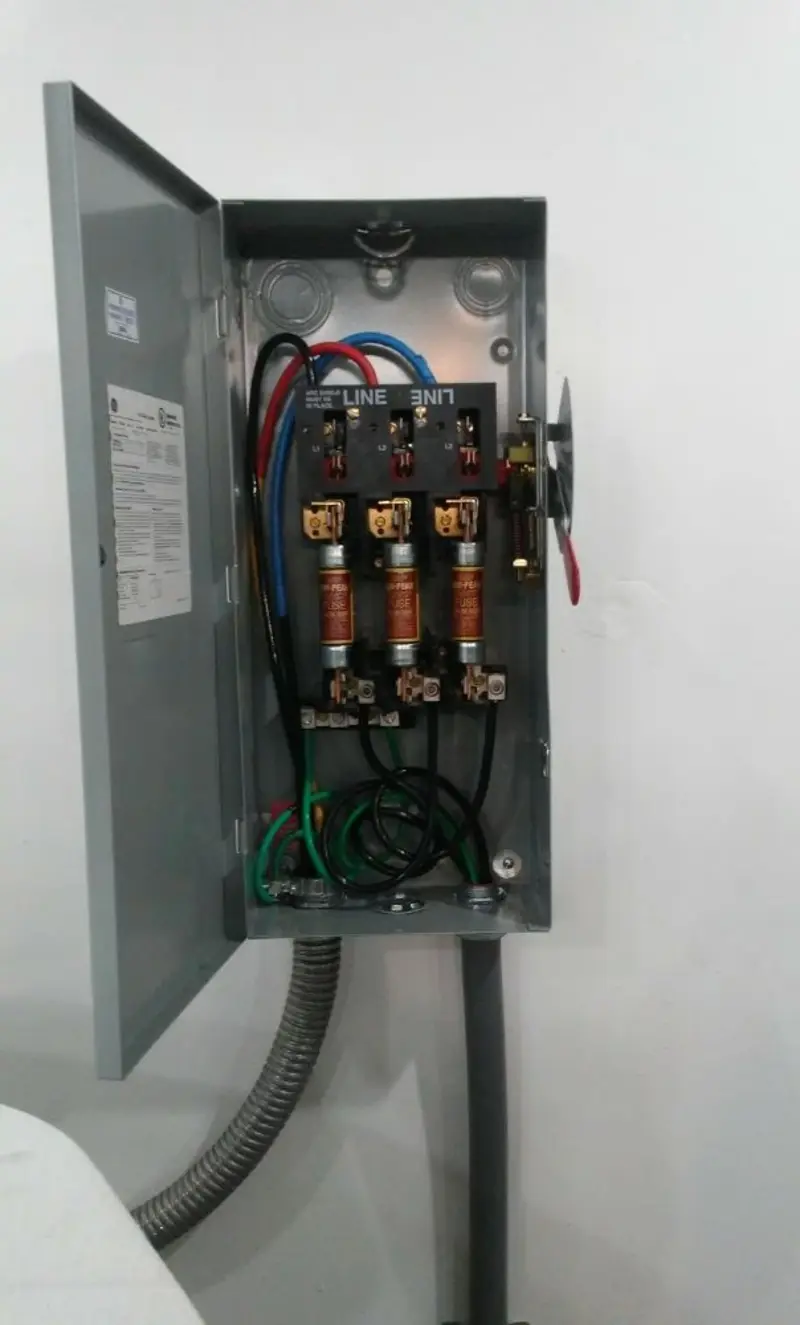 Three-phase disconnect switch installed for Smoke Detector Installation in Elburn