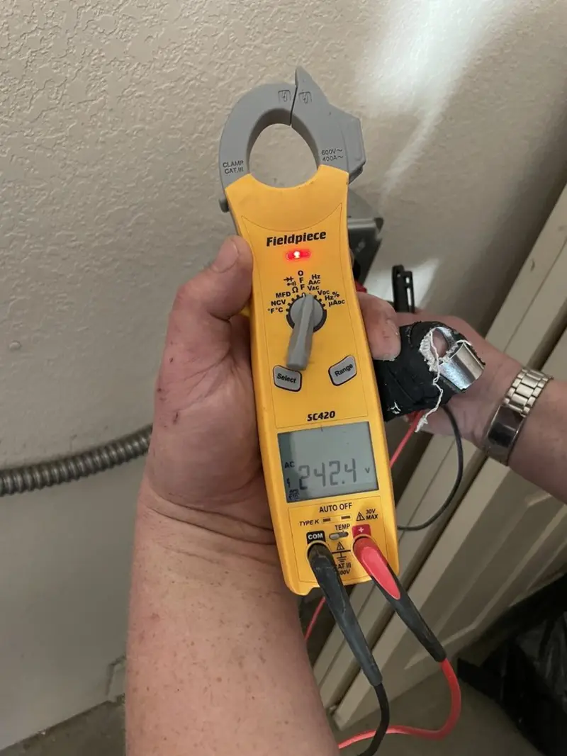 Voltage testing with clamp meter during Aluminum Wiring Replacement in Elburn